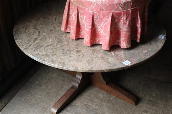 Oval marble topped coffee table, on walnut cruciform base(-)